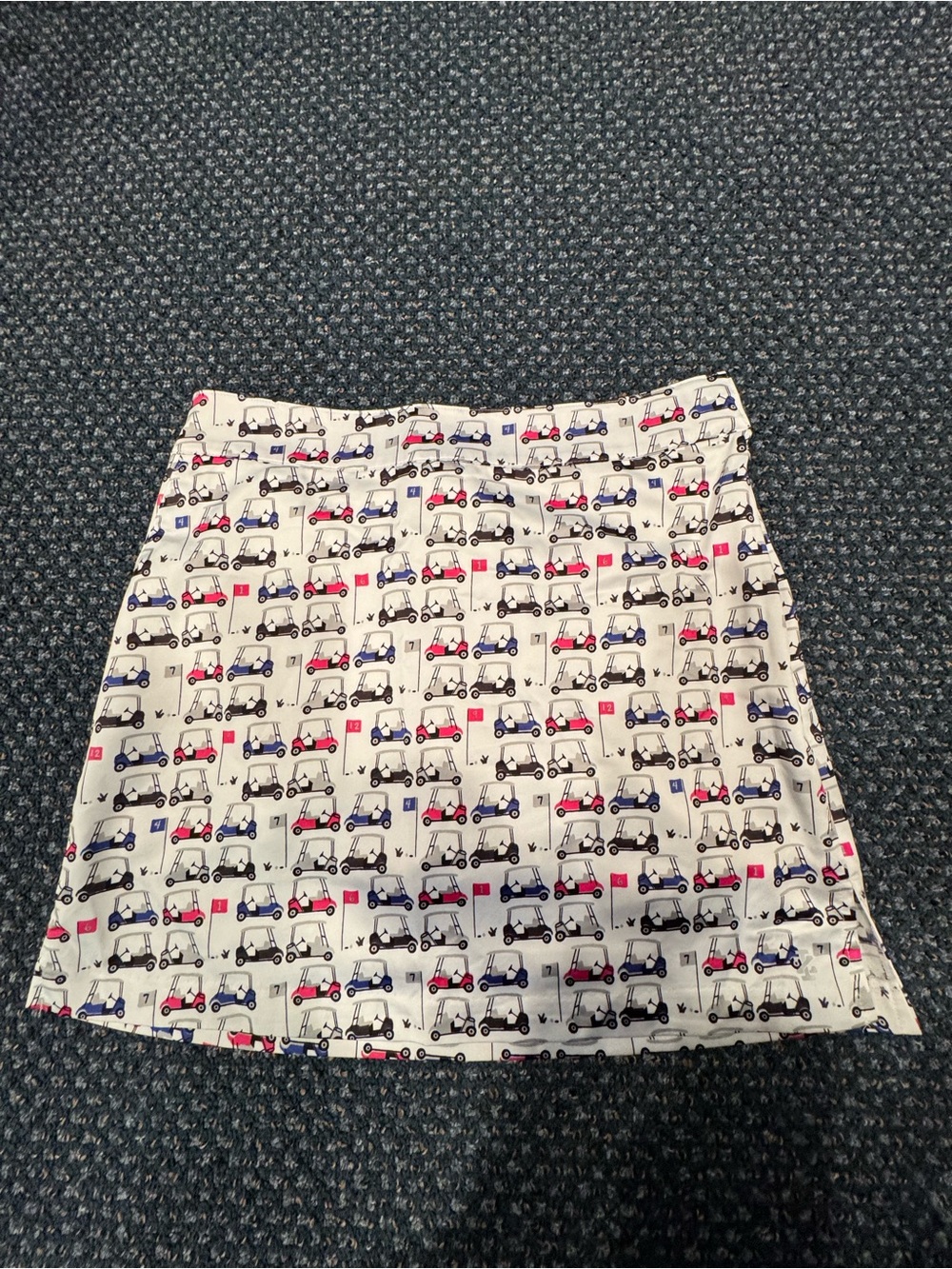 Izod White Skirt with Red, Blue & Black Golf Cart Print